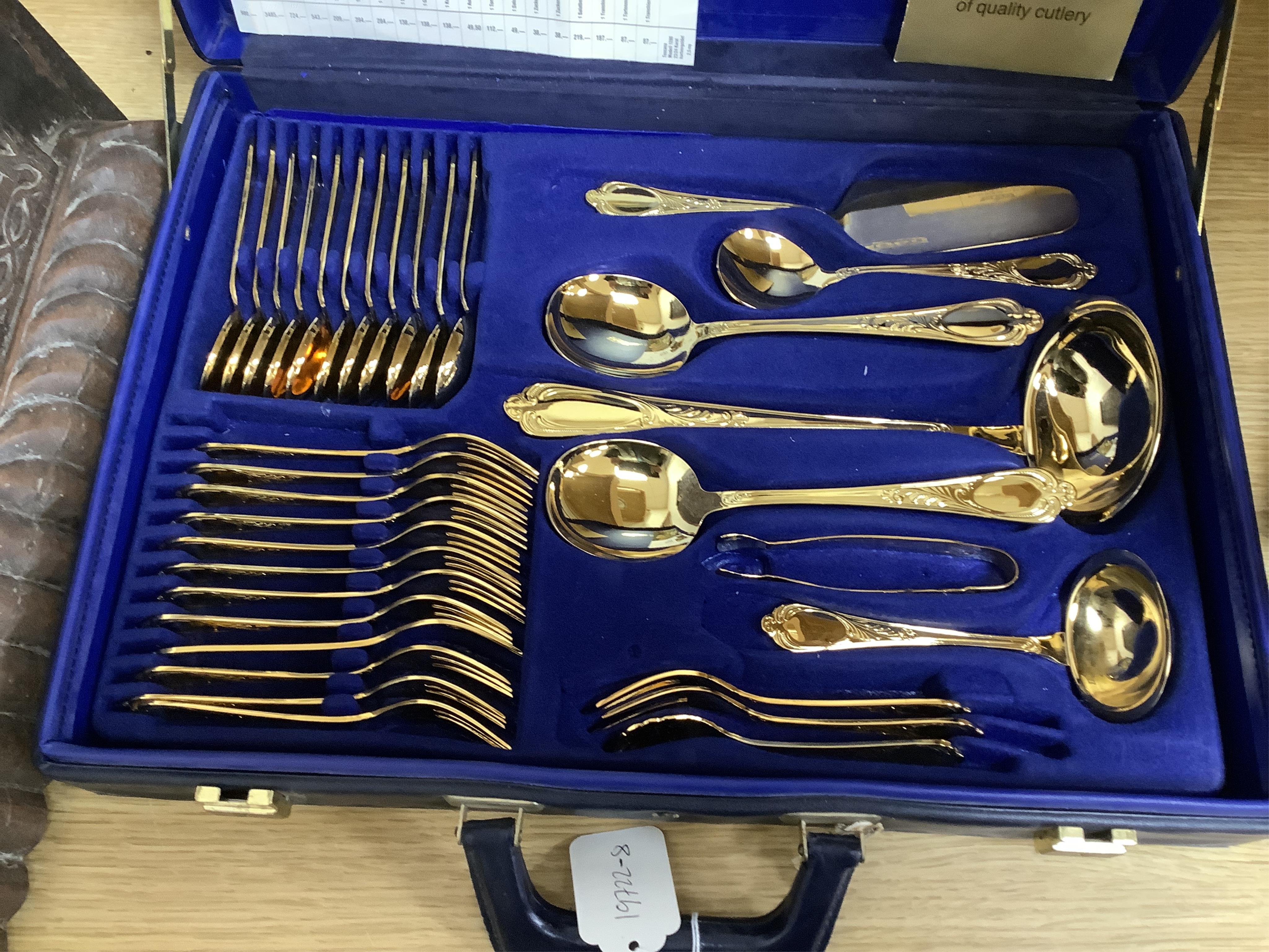 A Bestecke Solingen gold plated canteen of cutlery
